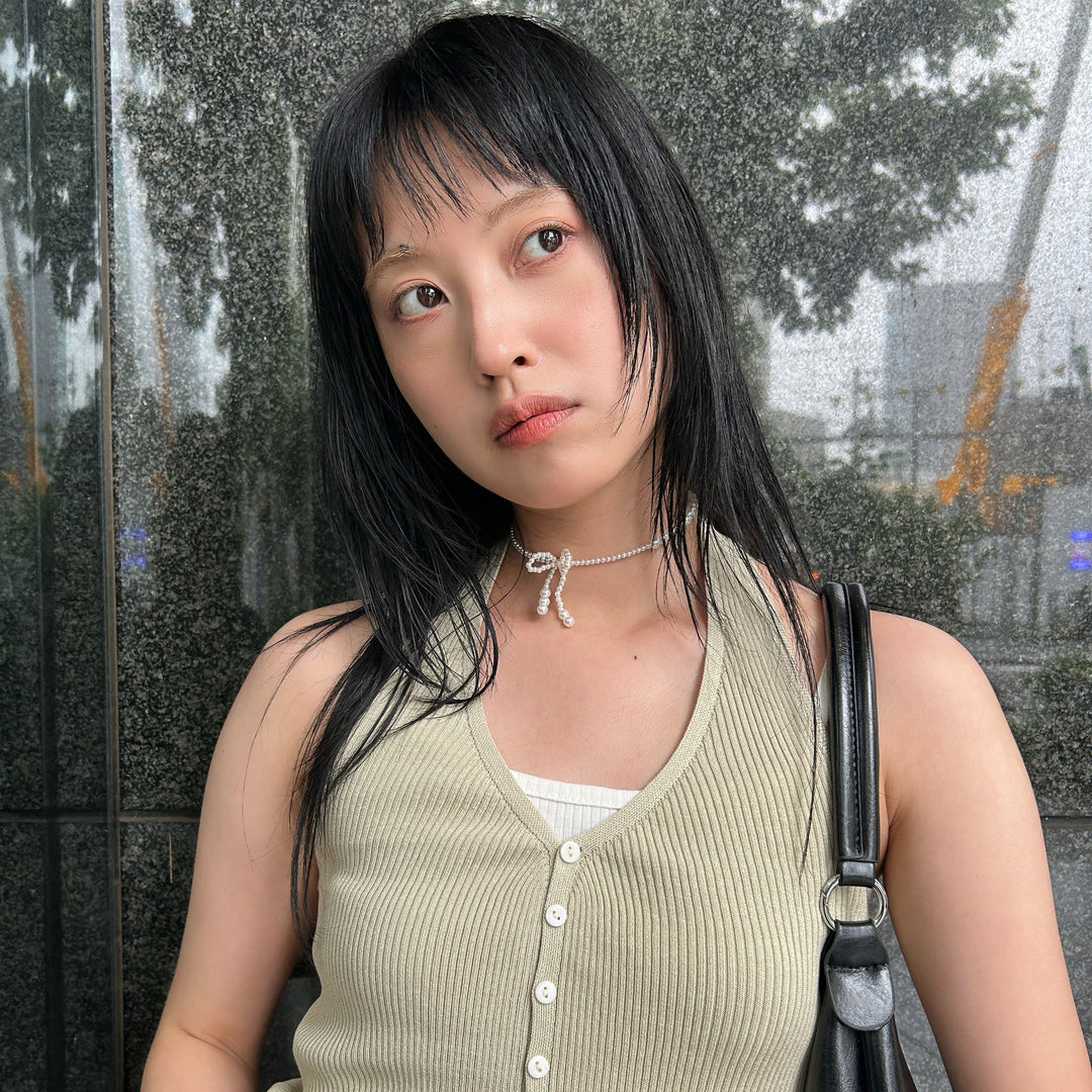 存在感のあるパールリボンネックカフで大人可愛い雰囲気に♡