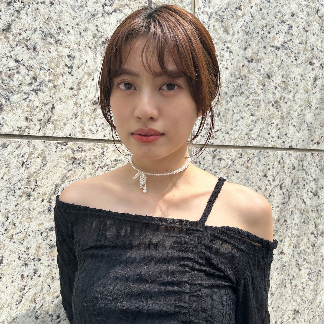 リボンがポイントのパールネックカフは程よい存在感で首元が華やかに♡