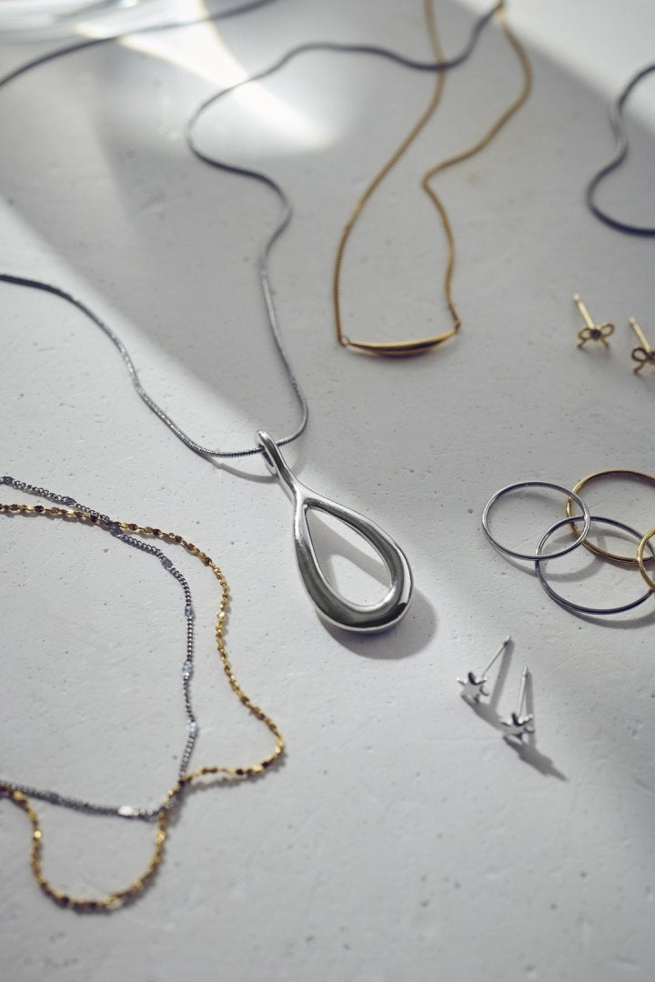 プチ リボン ステンレス ピアス