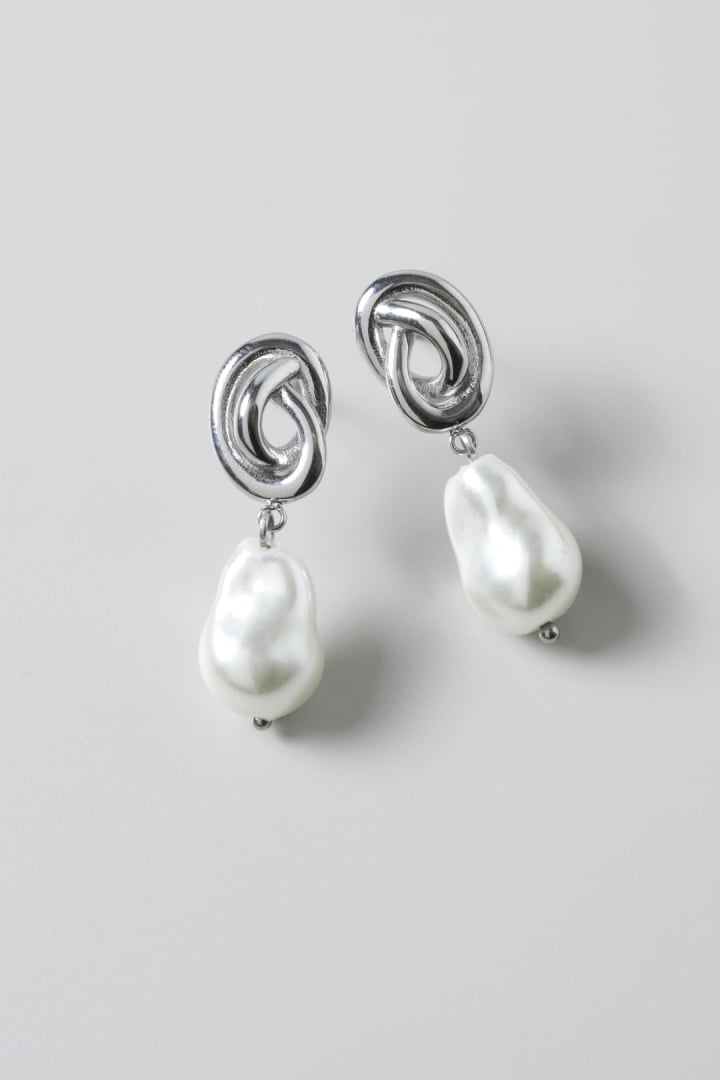 ノット × グラス パール ステンレス ピアス