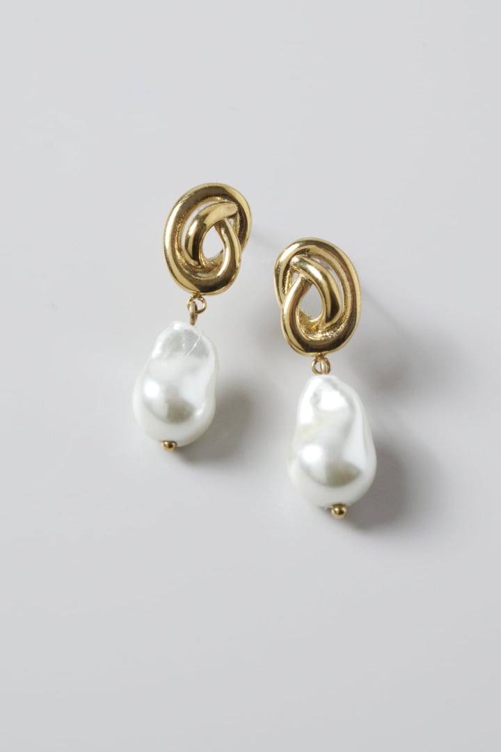 ノット × グラス パール ステンレス ピアス