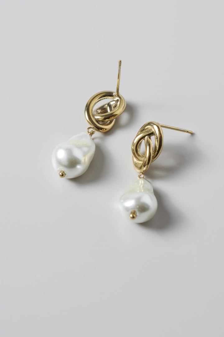 ノット × グラス パール ステンレス ピアス