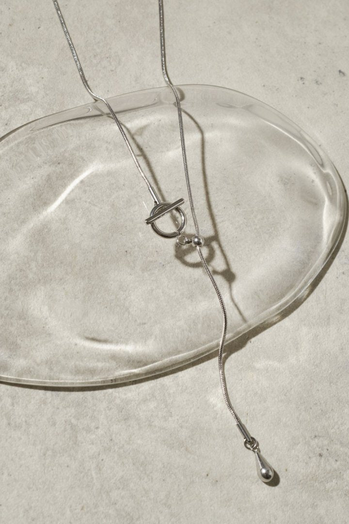 マンテル × スネーク チェーン ステンレス ネックレス