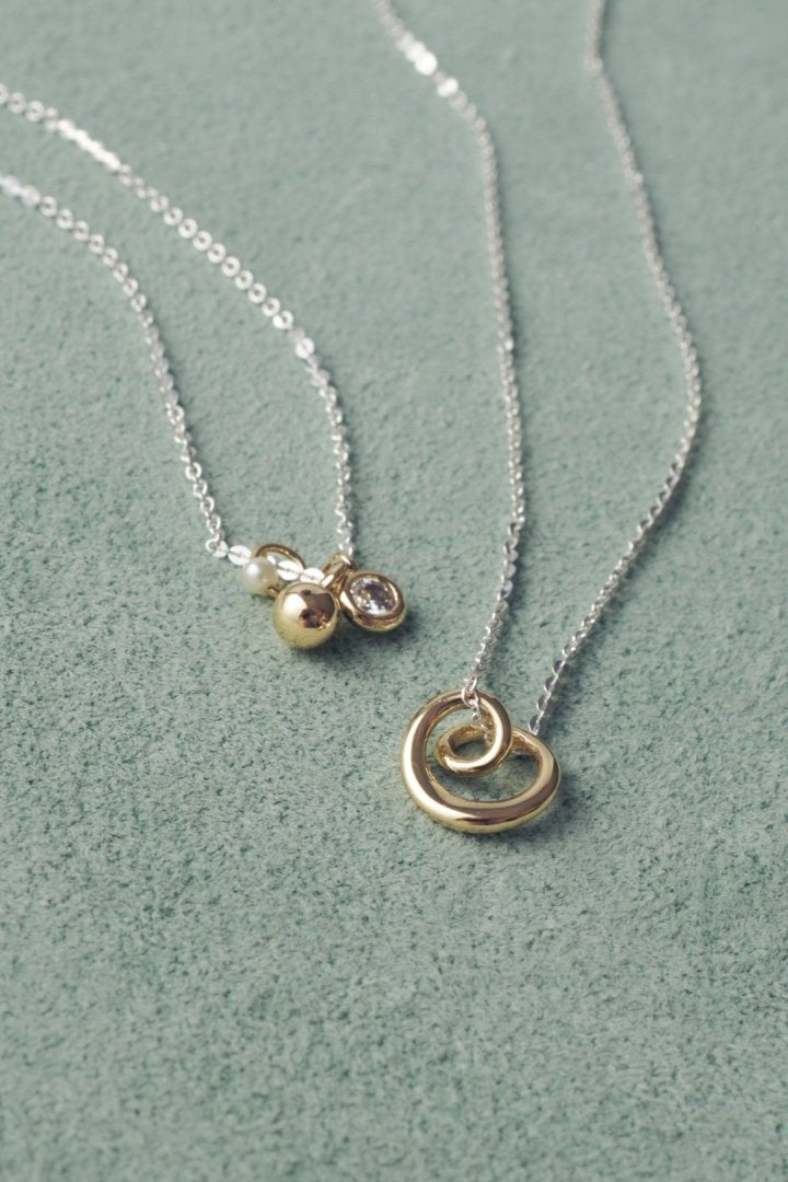 マイクロ チャーム スパイラル ネックレス
